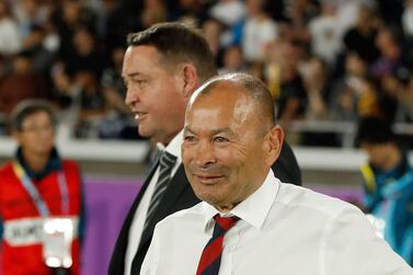 TOPSHOT - England's head coach Eddie Jones (R) and New Zealand's head coach Steve Hansen react after the Japan 2019 Rugby World Cup semi-final match between England and New Zealand at the International Stadium Yokohama in Yokohama on October 26, 2019. / AFP / Odd Andersen