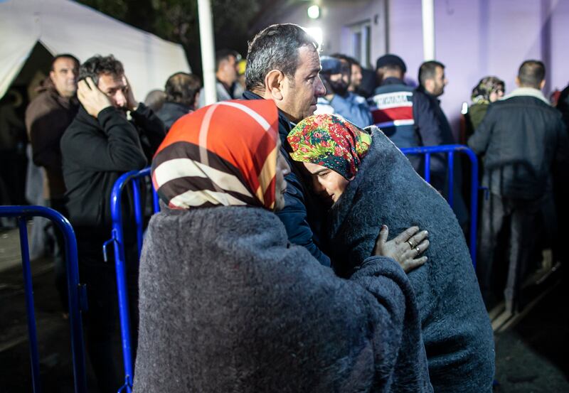 Relatives of miners anxiously wait for news of their loved ones. EPA