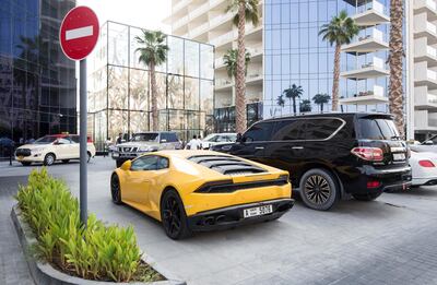 DUBAI, UNITED ARAB EMIRATES, 07 August 2018 - A Lamborghini car involve in a 170,000 speeding fine parked at Five Hotel, Palm Jumeirah, Dubai.  Leslie Pableo for The National 