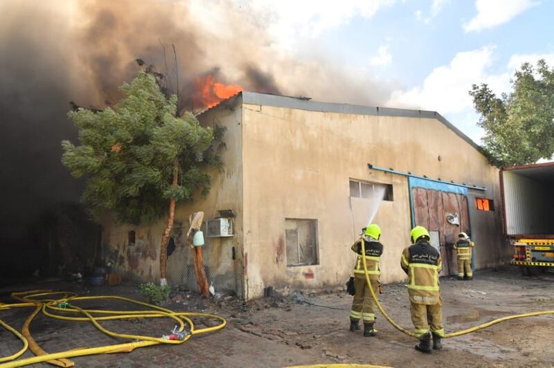 Firefighters tackle the blaze in the Ras Al Khor industrial area.