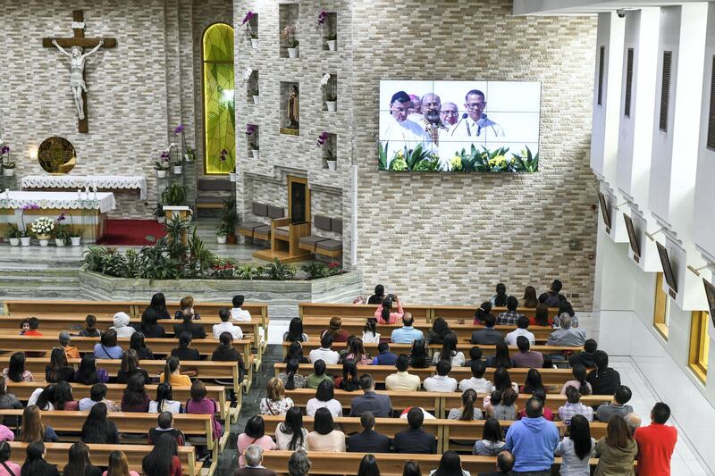 Abu Dhabi, United Arab Emirates - Worshippers view the historic Papal mass at St. JosephÕs Cathedral on February 5, 2019. Khushnum Bhandari for The National