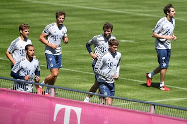 epa08404493 Bayern Munich players attend their team's training session at the German Bundesliga club's ground in Munich, Germany, 06 May 2020. The German Football Association (DFL) has presented a comprehensive concept for the resumption of play amid the ongoing coronavirus COVID-19 pandemic. In order to slow down the spread of the COVID-19 disease caused by the SARS-CoV-2 coronavirus, the Bundesliga has been on a break since 13 March 2020. EPA/LUKAS BARTH-TUTTAS
