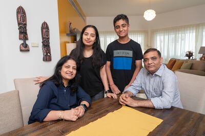 Arpita Trivedi and her family use buckets for bathing, to save water at their home in Dubai.
Antonie Robertson/The National
