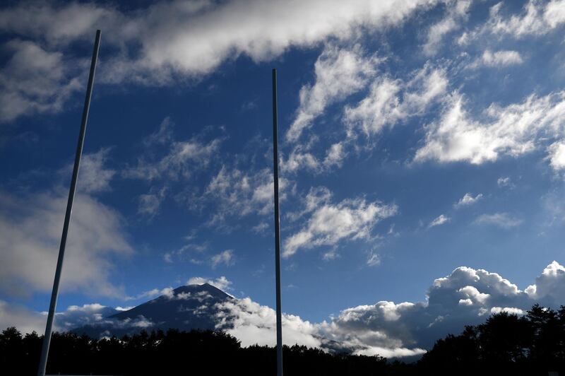 Mount Fuji is seen in the background behind a set of goal posts in Fujiyoshida. AFP