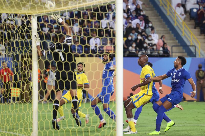 Al Hilal goalkeeper Abdullah Al Mayouf makes a save. AFP
