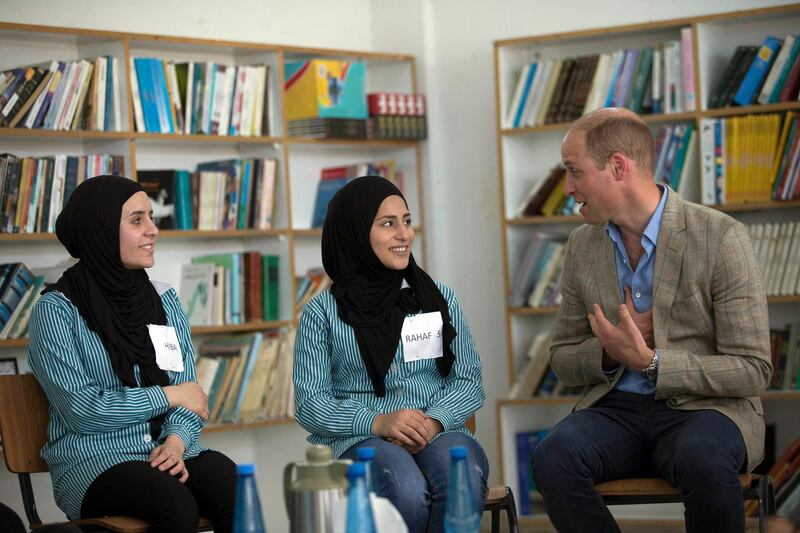 Britain's Prince William, visits with Palestinian students inside a school run by UNRWA in the Al-Jalzoun refugee camp near the West Bank city of Ramallah. Fadi Arouri / AP Photo