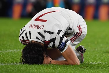 Edinson Cavani of Manchester United goes down injured against Istanbul Basaksehir. Getty