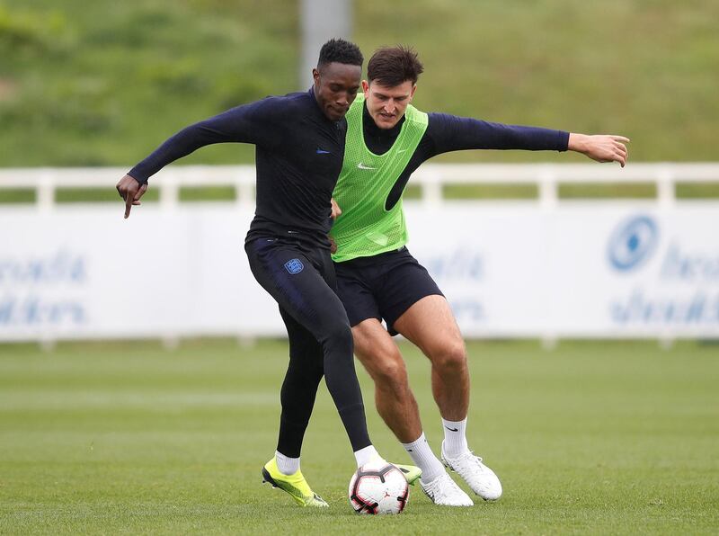 Harry Maguire and Danny Welbeck during training. Action Images via Reuters