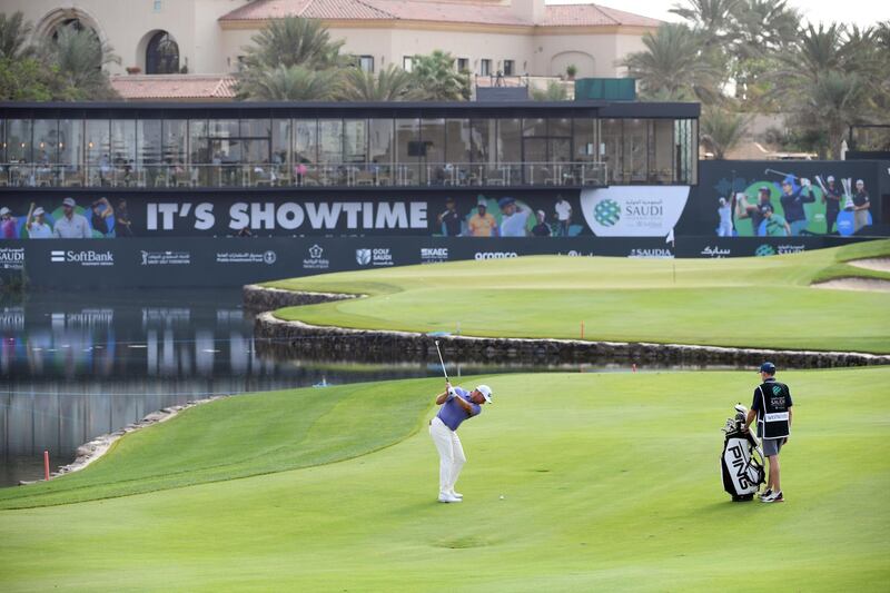 England's Lee Westwood of England plays his third shot on the 18th hole on his way to an opening round 67. Getty