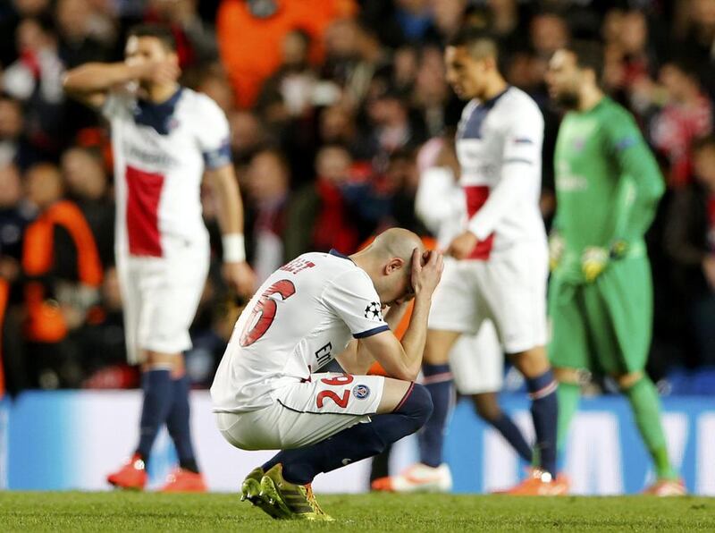 Paris Saint-Germain player Christophe Jallet and teammates react after being defeated by Chelsea during their Champions League quarter-final second leg match on Tuesday. Stefan Wermuth / Reuters / April 8, 2014