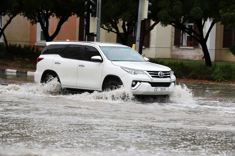 Flooded streets around Discovery Gardens after heavy rain in Dubai. Pawan Singh / The National 