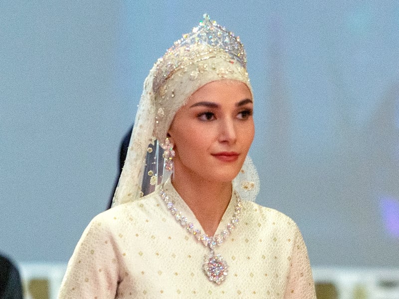 The royal bride Anisha Rosnah enters the royal throne hall during the royal wedding ceremony at Istana Nurul Iman. EPA