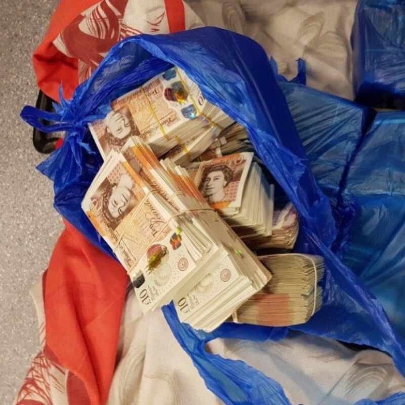 Investigators carried out a series of raids on a gang suspected of smuggling £15.5 million of dirty money in suitcases from Britain to Dubai. Image courtesy: UK National Crime Agency
