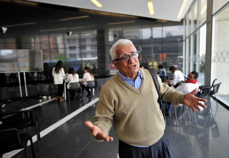 Daniel Valbuena, father of a former member of the  Revolutionary Armed Forces of Colombia (FARC), gestures at the Special Jurisdiction for Peace (JEP) tribunal, in Bogota, Colombia March 15, 2018.   REUTERS/Carlos Julio Martinez NO RESALES. NO ARCHIVES.