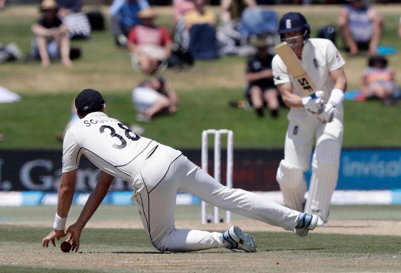 New Zealand's Tim Southee stops a shot from England batsman Joe Denly. AP