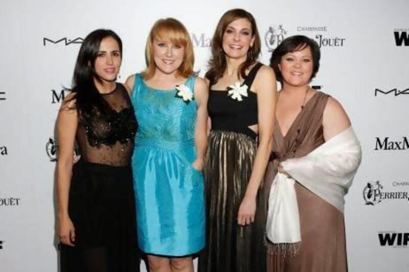 Ras al Khaimah professor Cambria Russell (far right), with Vanessa Bergonzoli, Robin Honan, Cynthia Wade, attending the 6th Annual Women in Film Pre-Oscar cocktail party at Fig and Olive on Feb. 22, 2013 in Los Angeles. Courtesy AP