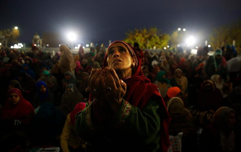 Muslim women pray on Eid-e-Milad-u-Nabi, the birthday of Prophet Mohammad, at the Hazratbal Shrine in Srinagar, the summer capital of Indian Kashmir. EPA