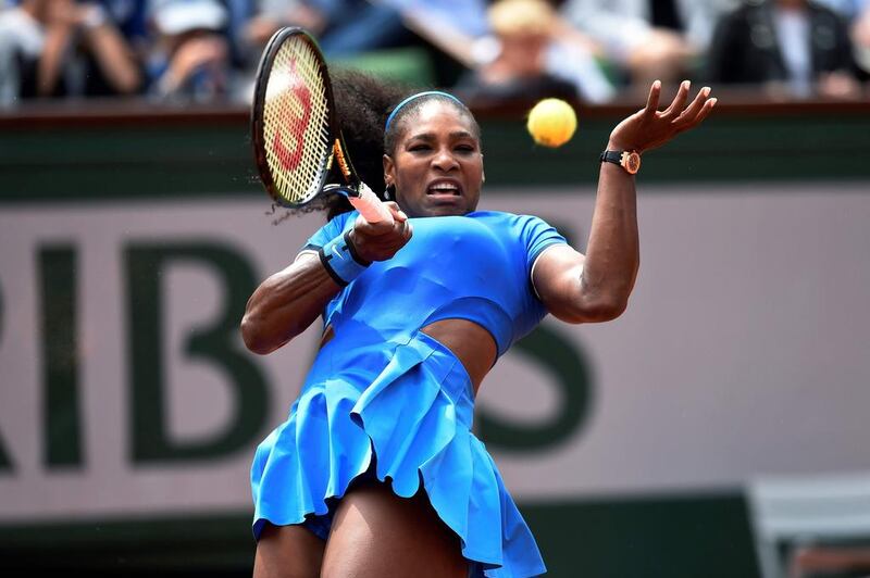 US player Serena Williams returns the ball to France’s Kristina Mladenovic during their women’s third round match at the Roland Garros 2016 French Tennis Open in Paris on May 28, 2016. / AFP / MIGUEL MEDINA