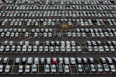 New cars in a compound in Sheerness in Kent, south east England. Sales stalled at 113,781 cars in November, with 42,840 fewer vehicles joining Britain's roads. AFP