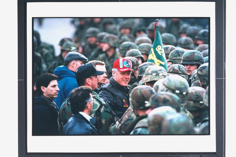 Pres. Bill Clinton (C) amid crowd of US soldiers, visiting troops on peacekeeping mission, enforcing provisions of Dayton, US-brokered peace accord in civil war-torn former Yugoslav republic.  (Photo by Diana Walker//The LIFE Images Collection via Getty Images)