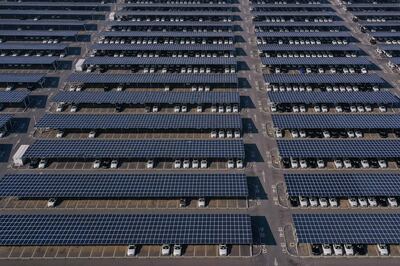 An aerial photo shows newly produced cars at a BMW factory in Shenyang, China. AFP