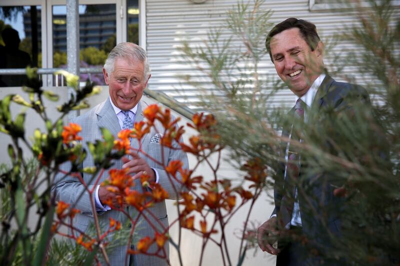 Britain's Prince Charles talks with Chief Executive Officer of the Botanic Gardens and Parks Authority, Mark Webb during a visit to the Biodiversity Conservation Centre in Perth on November 15, 2015. The Royal couple are on a 12-day tour visiting seven regions in New Zealand and three states and one territory in Australia. AFP PHOTO / POOL / Richard Wainwright (Photo by RICHARD WAINWRIGHT / POOL / AFP)