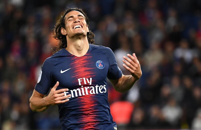 Paris Saint-Germain's Uruguayan forward Edinson Cavani celebrates after scoring a goal during the French L1 football match between Paris Saint-Germain (PSG) and Saint-Etienne (ASSE) at the Parc des Princes stadium in Paris on September 14, 2018. / AFP / Anne-Christine POUJOULAT
