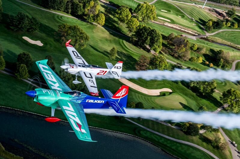 Matthias Dolderer flies in formation with Yoshihide Muroya over the Indianapolis Motor Speedway ahead of the seventh round of the Red Bull Air Race World Championship in the United States. Predrag Vuckovic/AP Photo
