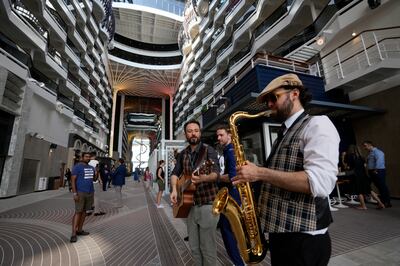A band plays for passengers inside the 22-deck MSC World Europa. AP