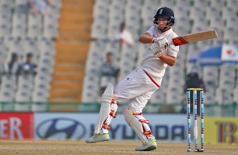 Joe Root's aggressive batting style could help reshape the England cricket side, according to teammate Stuart Broad. Altaf Qadri / AP Photo