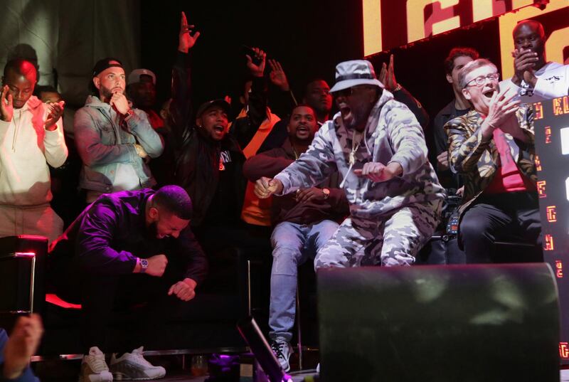 Drake, left, and Toronto mayor John Tory, far right, enjoyed a fun night as Toronto Raptors made history. Reuters