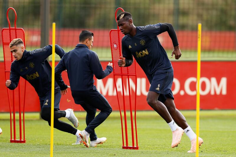 Andreas Pereira, Sanchez and Pogba during training. Action Images via Reuters