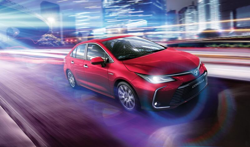 The Corolla in city lights.