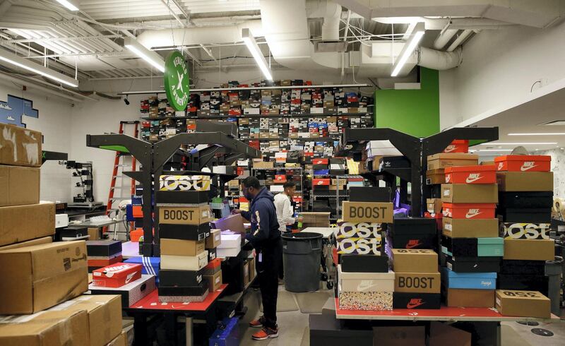 The authenticating room for sneakers is viewed at Stock X on January 10, 2018 in Detroit, Michigan. - This bag was sold for $1200 USD and the money will be refunded to the seller. StockX is a live auction site for resale of high-end sneakers, handbags, streetwear and watches. StockX experts authenticate items sold through their site. (Photo by JEFF KOWALSKY / AFP) / With AFP Story by Luc OLINGA