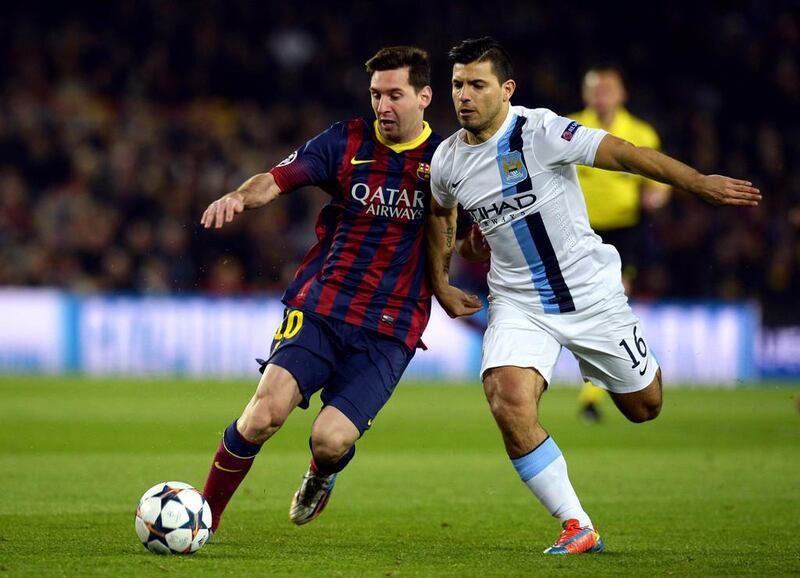 Barcelona with Lionel Messi, left, will be a tough opposition for Manchester City, who may be without Sergio Aguero. Lluis Gene / AFP