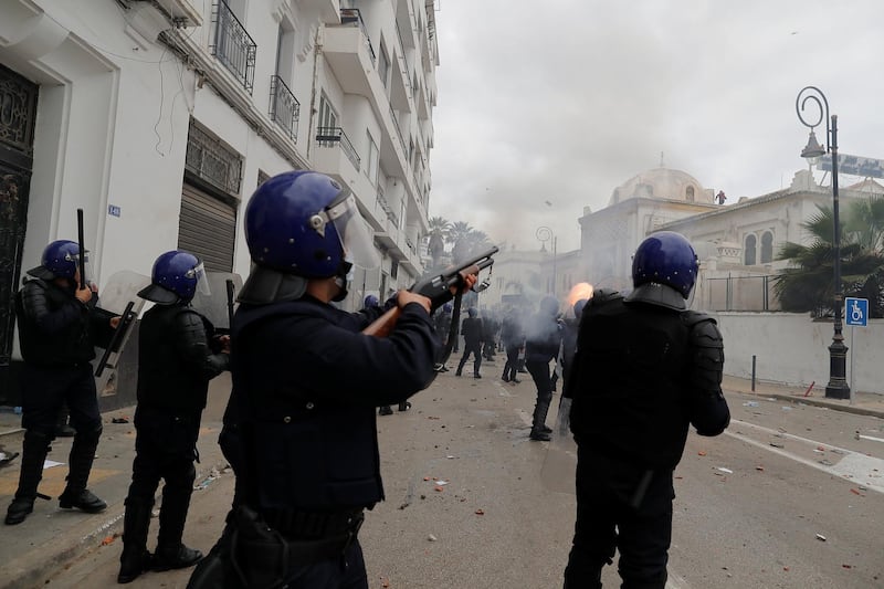 Anti-riot police clash with people protesting against President Abdelaziz Bouteflika, in Algiers, Algeria. Reuters