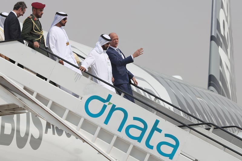 Vice President and Ruler of Dubai, Sheikh Mohammed bin Rashid, centre left, disembarks from a plane during the Dubai Airshow on November 12, 2017. Karim Sahib / AFP