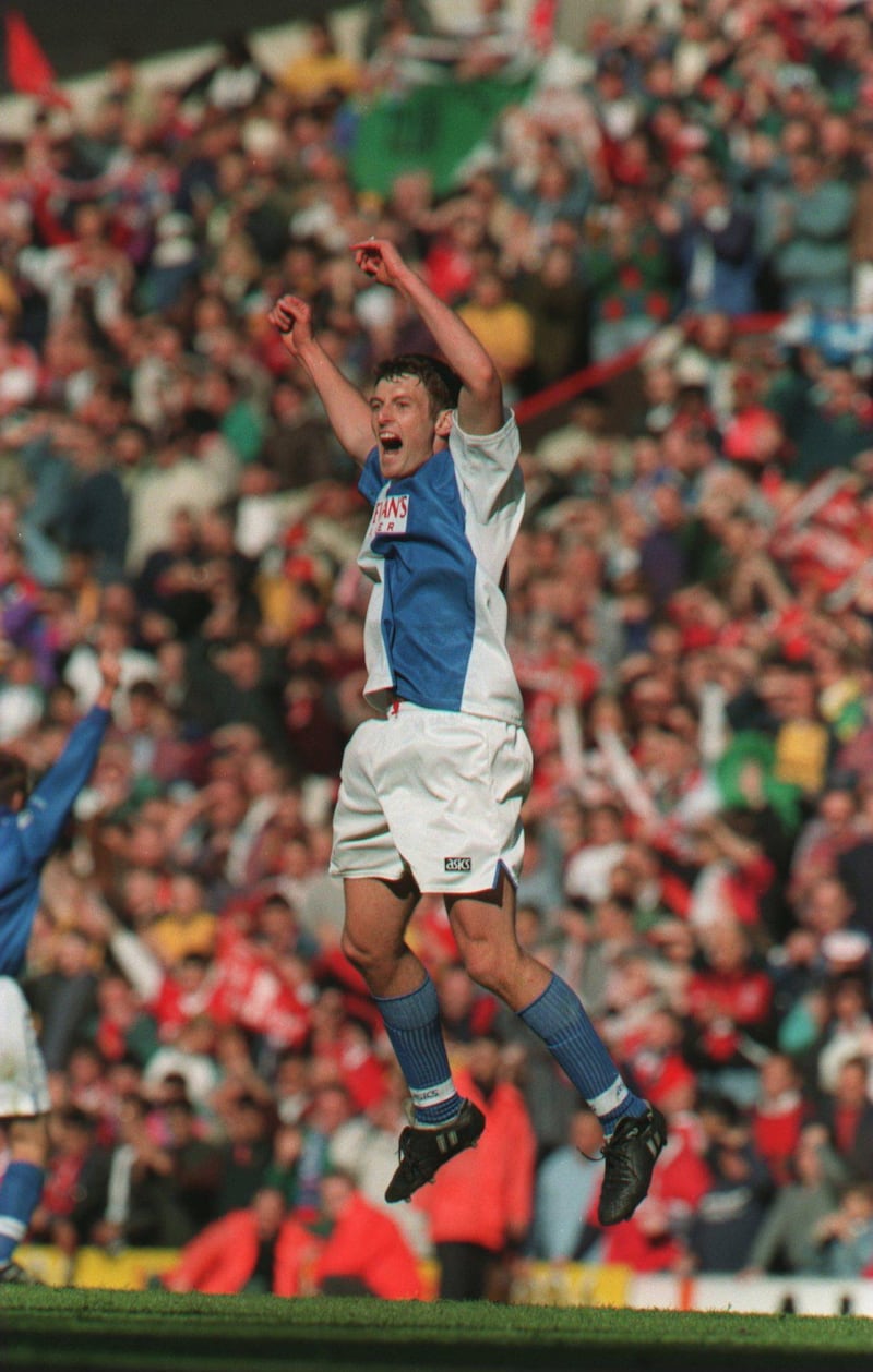14 MAY 1995:  CHRIS SUTTON OF BLACKBURN ROVERS JUMPS UP TO CELEBRATE AFTER BLACKBURN WIN THE FA CARLING PREMIERSHIP TROPHY DESPITE LOSING TO LIVERPOOL 2-1 IN THEIR FA PREMIERSHIP AT ANFIELD , LIVERPOOL TODAY. Mandatory Credit: Allsport UK/ALLSPORT