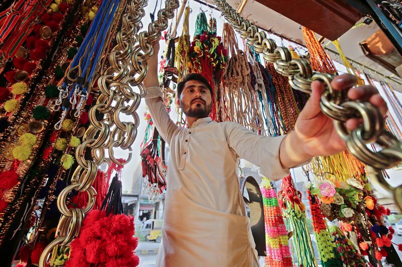 Ornaments for sacrificial animals at a roadside shop before Eid Al Adha in Peshawar, Pakistan. EPA