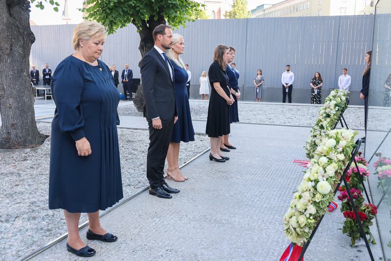 Then-Norwegian prime minister Erna Solberg, Crown Prince Haakon Magnus and Crown Princess Mette-Marit attend the memorial service in the Government Quarter in Oslo, close to where Breivik set off a lethal bomb before he caught a ferry to Utoya and carried out a mass shooting. EPA