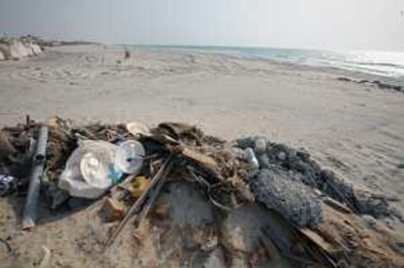 UMM AL QUWAIN, UNITED ARAB EMIRATES - JULY 25:  Garbage seen on the public beach in Umm Al Quwain on July 25, 2009.  (Randi Sokoloff / The National)  For news story *** Local Caption ***  RS001-072509-UAQ.jpg