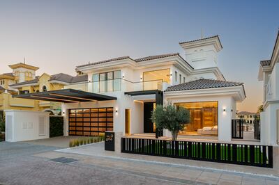 Villa Opus comes with a showroom-style garage. Photo: haus & haus