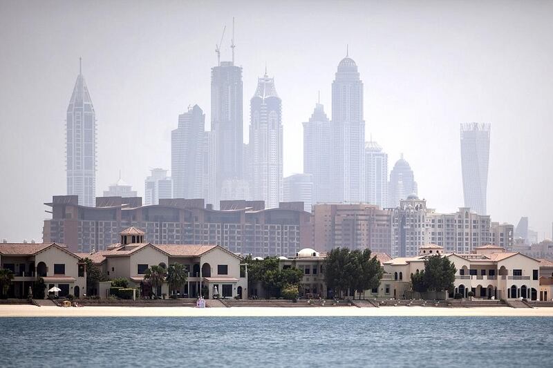 The view of Dubai Marina and Palm Jumeirah from the Sofitel The Palm hotel at the Palm Jumeirah in Dubai. The rise in Dubai property prices is unsustainable according to Jones Lang LaSalle. Silvia Razgova / The National