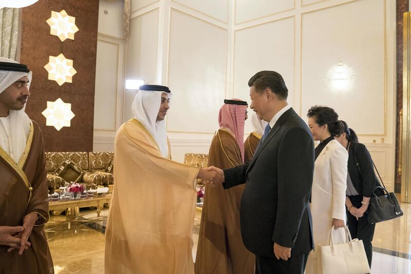 ABU DHABI, UNITED ARAB EMIRATES - July 19, 2018: HH Sheikh Mansour bin Zayed Al Nahyan, UAE Deputy Prime Minister and Minister of Presidential Affairs (2nd L) greets HE Xi Jinping, President of China (R), during a reception held at the Presidential Airport. Seen with HH Sheikh Abdullah bin Zayed Al Nahyan, UAE Minister of Foreign Affairs and International Cooperation (L).

( Mohamed Al Hammadi / Crown Prince Court - Abu Dhabi )
---