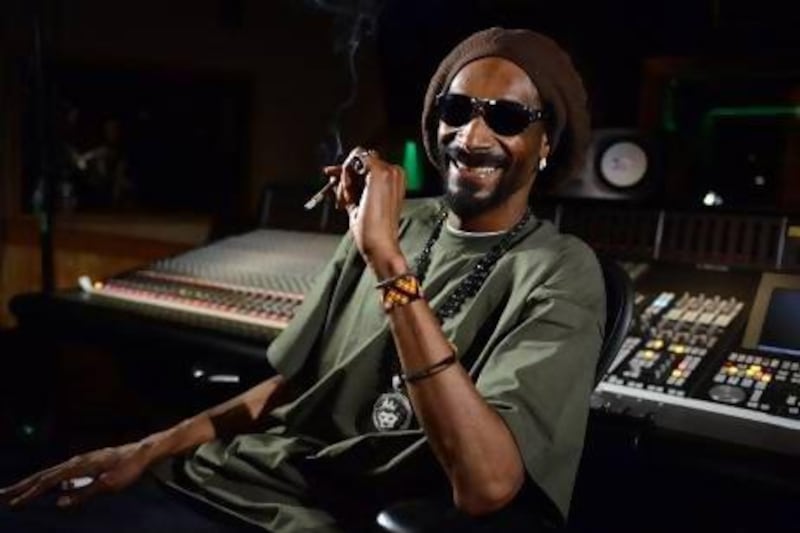Snoop Lion has converted to Rastafarianism and claims to be Bob Marley reincarnated. Jordan Strauss / Invision / AP Photo