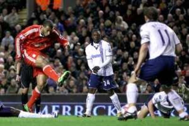 LIVERPOOL, ENGLAND - MARCH 15:  Ryan Babel of Liverpool scores his team's second goal during the Barclays Premier League match between Liverpool and Portsmouth at Anfield on March 15, 2010 in Liverpool, England. (Photo by Alex Livesey/Getty Images) *** Local Caption ***  GYI0059914881.jpg *** Local Caption ***  GYI0059914881.jpg