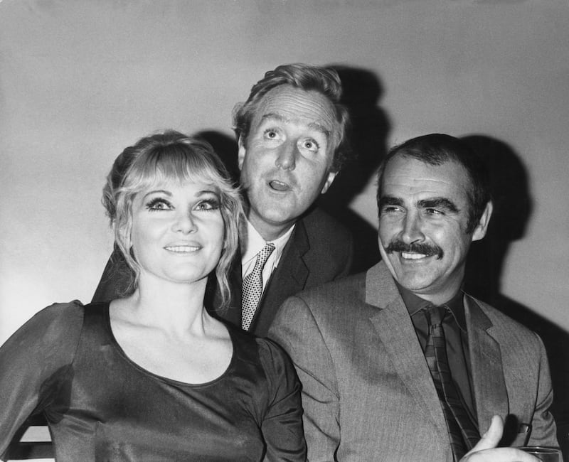 From left to right, actors Diane Cilento, Robert Hardy and Sean Connery at a press reception at the Mayfair Hotel in London, to announce their upcoming West End play 'I've Seen You Cut Lemons', 30th October 1969. The play will be directed by Connery, and star Cilento and Hardy. (Photo by Davies/Keystone/Hulton Archive/Getty Images)