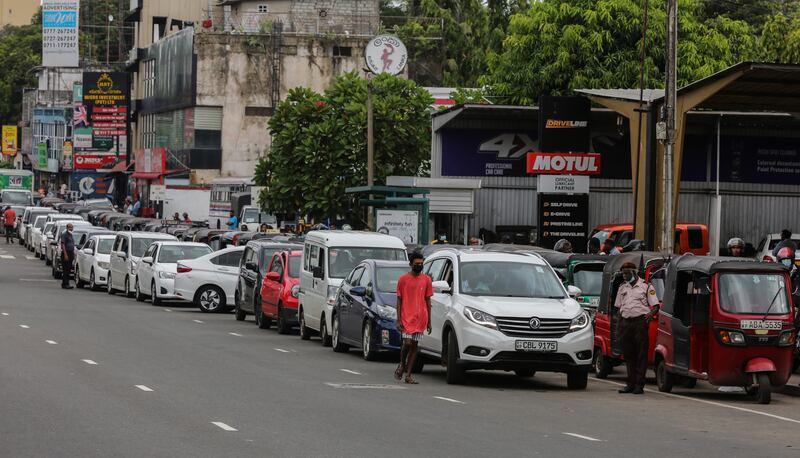Vehicles queue as motorists fetch fuel from a gas station amid a fuel shortage in Colombo, Sri Lanka. EPA