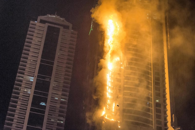 DUBAI. UNITED ARAB EMIRATES, 04 AUGUST 2017. A massive fire rips through The Marina Torch tower's southern corner. (Photo: Antonie Robertson) Journalist: None. Section: National.