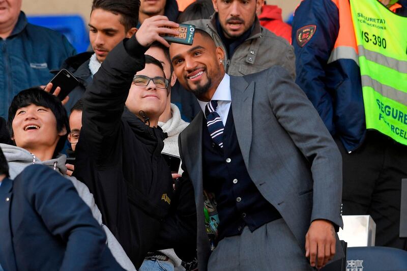 Barcelona's new Ghanaian forward Kevin-Prince Boateng poses for a selfie with fans at Camp Nou. AFP